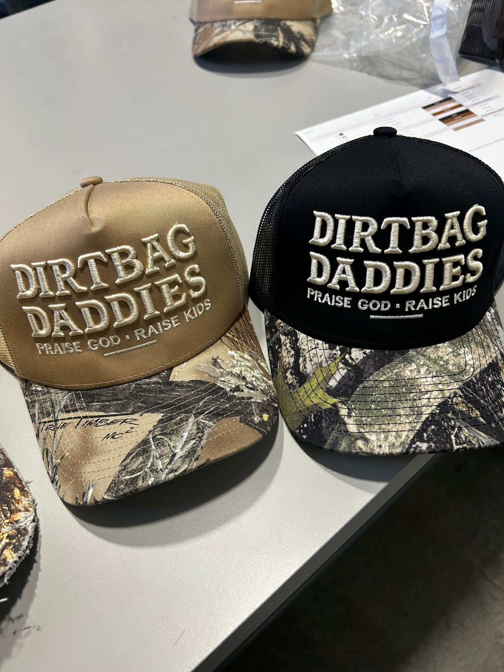 Praise God Raise Kids Distressed Camo Trucker Hat